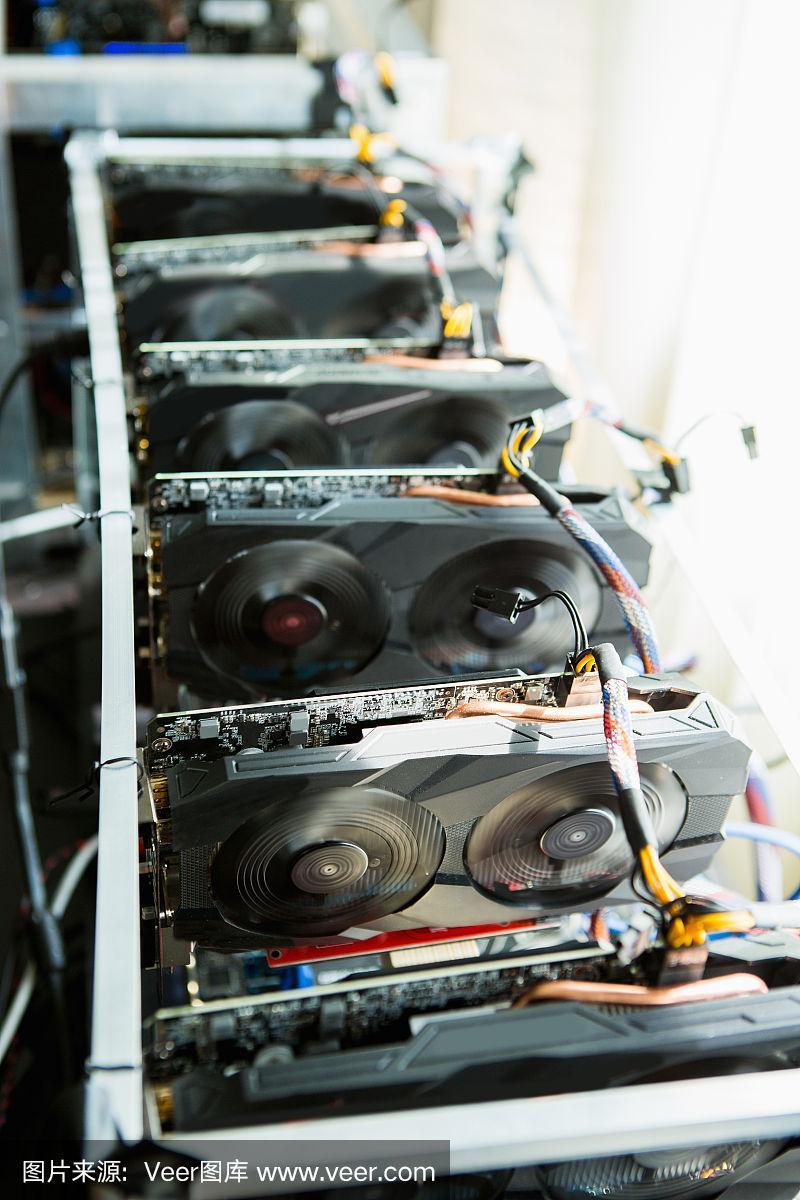 A group of miners working on the latest bitcoin mining rig models in a South Korean facility